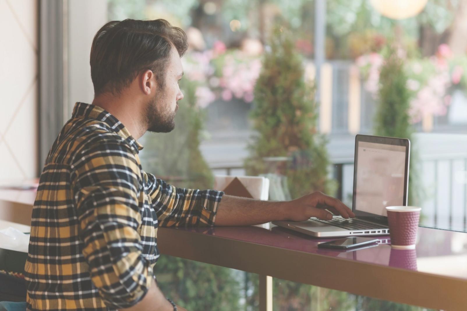 Person reviewing financial goals with organized documents